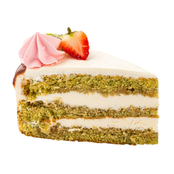 Isolated slice of decorated spinach sponge cake