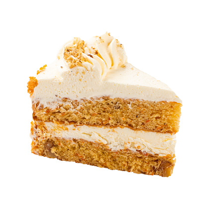 Isolated slice of carrot sponge cake frosted with cheese cream on the white background
