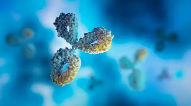 Antibodies floating on blue cell background - 3D illustration