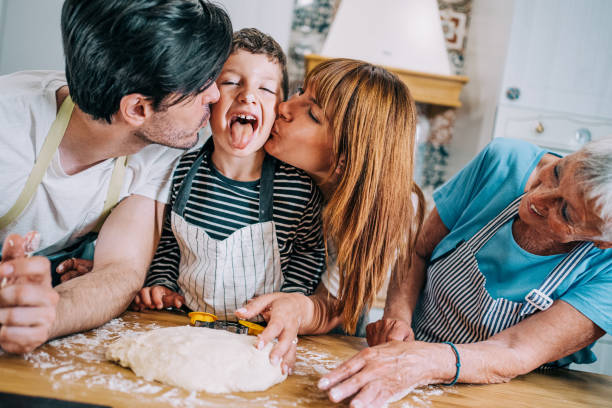 istock Multi-generation family having fun in the kitchen. 1409880280