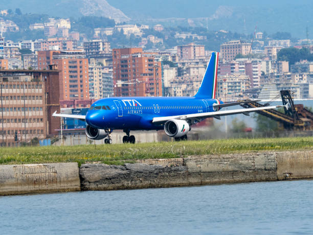 ITA Airways Airbus A320 airplane at Genova airport in Italy. Genova Italy - May 13, 2022: ITA Airways Airbus A320 airplane at Genova airport in Italy. respiratory tract stock pictures, royalty-free photos & images