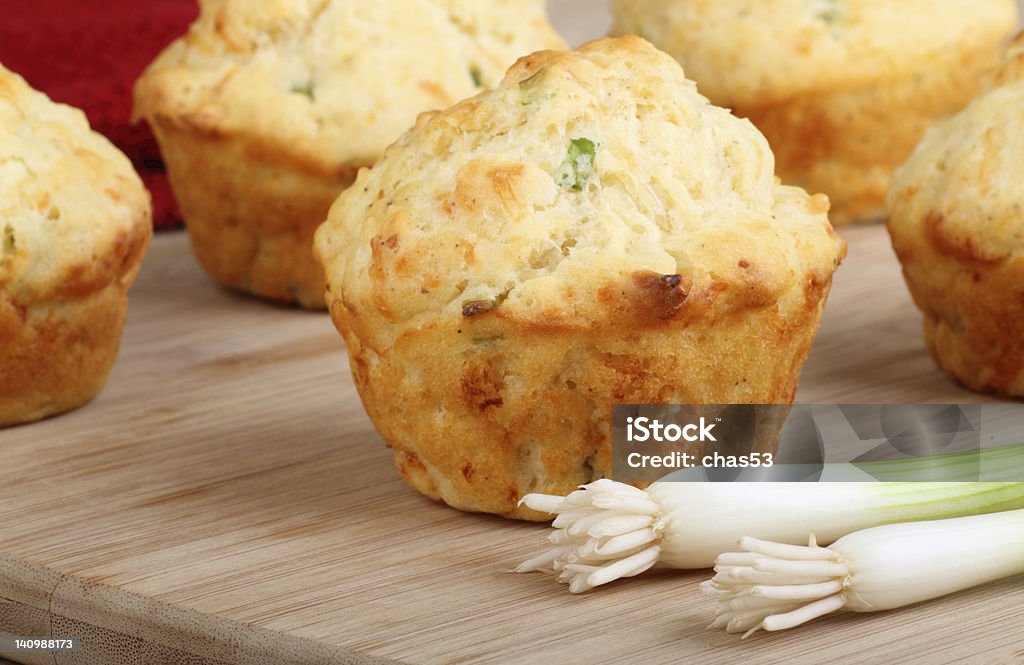 Onion Cheese Biscuits Closeup of onion cheese biscuits with two green onions Baked Stock Photo