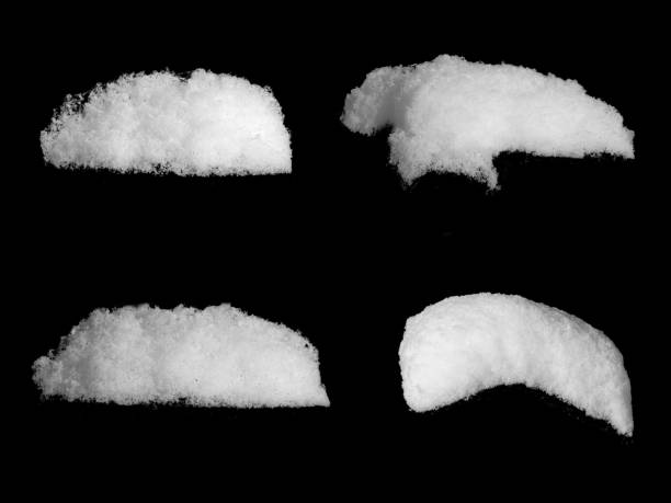 istock set of white snow isolated on a black background 1409885314