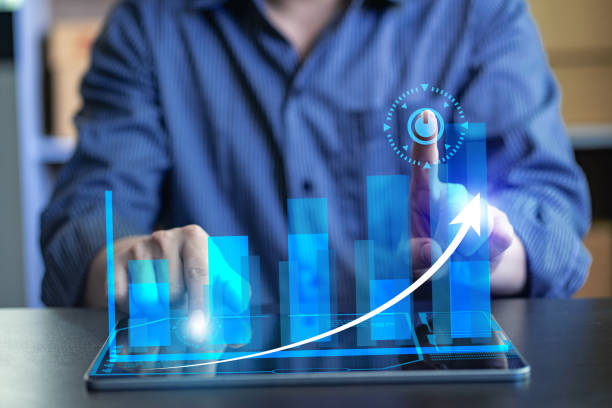 istock businessman using tablet Analytical concepts and finance and banking technology. and new business strategies, goals, plans, and visions of business growth idea 1409886142