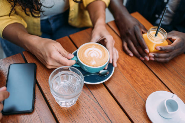 istock Young friends enjoying a coffee together. 1409886211