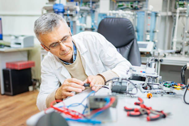 Robotics Test Engineer 1,200+ Engineer Testing Prototype Robotics Stock Photos, Pictures ...