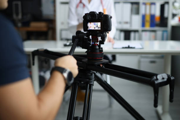 istock Videographer filming doctor on medical remote training 1409888861