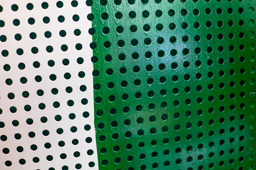 green and white porous walls