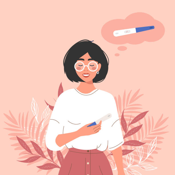 a happy young mum holds up a positive two-strip pregnancy test. the smile of a girl planning a baby. pregnancy, the concept of medicine. - 家庭計劃 幅插畫檔、美工圖案、卡通及圖標