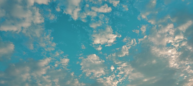 Azure Sky. Beautiful bright sky shot with clouds in bundles.