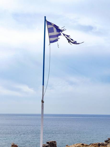 istock Damaged Greece flag on Rhodes Island 1409892542