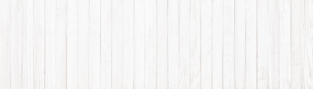 istock white wallpaper with wood texture. light board table in pastel colors 1409897407