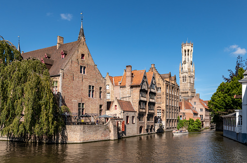 Bruges, Belgium. 16 July 2022. Famous wooden fronted building by the canal in Bruges