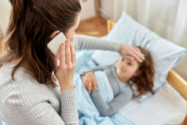 istock ill daughter and mother calling on phone at home 1409897718