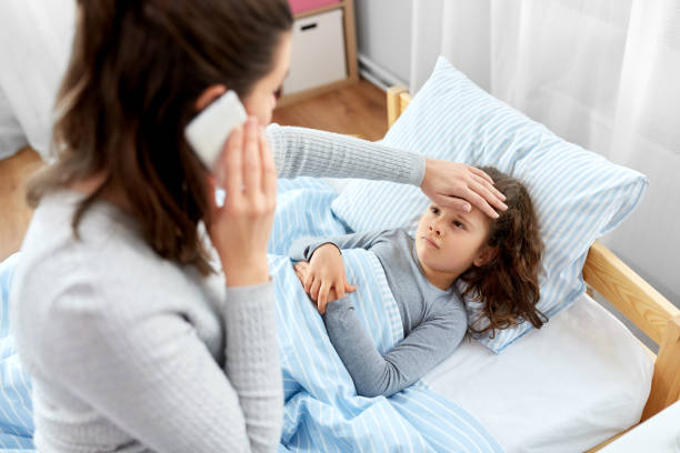 istock ill daughter and mother calling on phone at home 1409898703