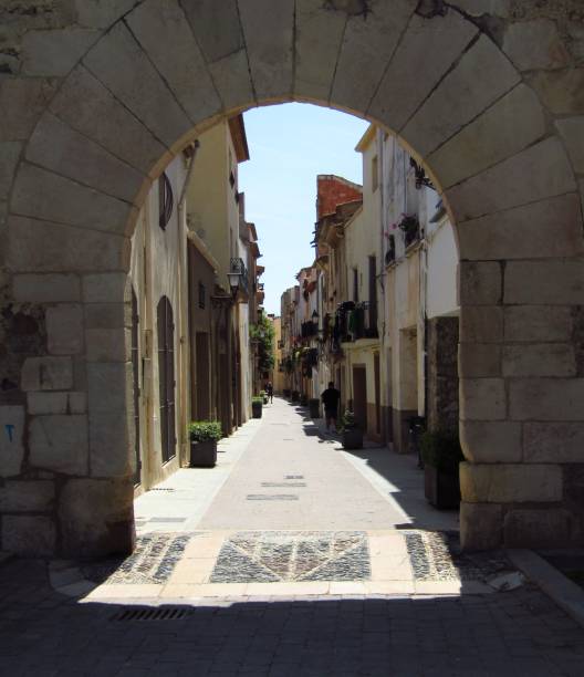 Archway at Carrer de la Corona dArago and Carrer Major Cambrils, Catalonia, Spain Street photography of residential building architecture, Spain, Cambrils, Catalunya cambrils stock pictures, royalty-free photos & images