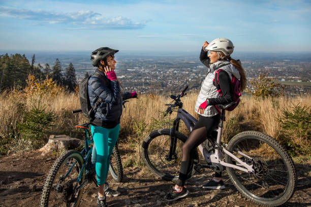 istock Two young women on a e-bike ride 1409912088