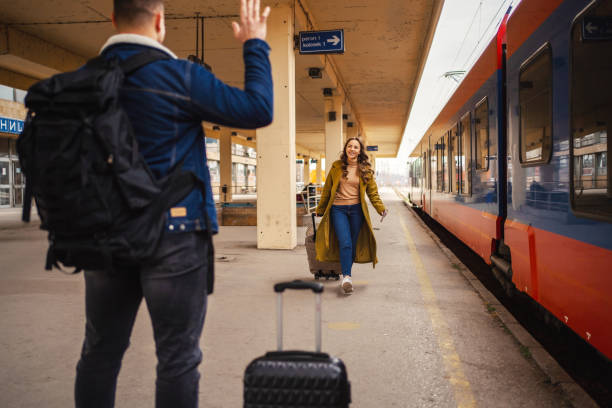 istock Boyfriend waiting for his girlfriends arrival on train station 1409914497