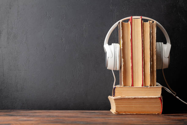 istock Old books and headphones 1409914951