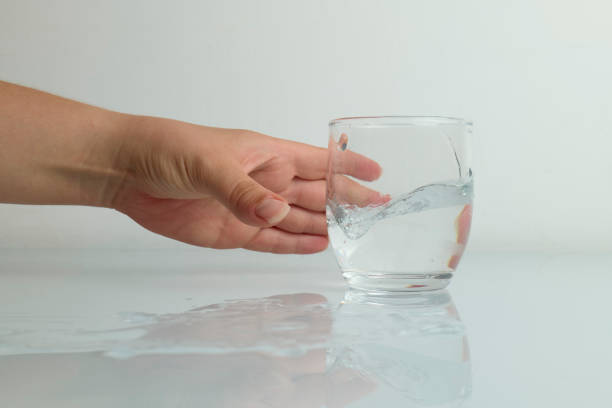 Glass of water on the table in living room