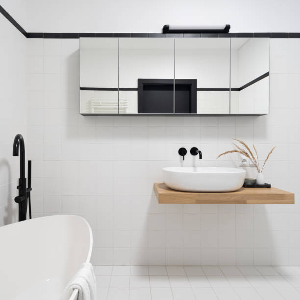 istock Spacious and simple bathroom with bathtub 1409917767