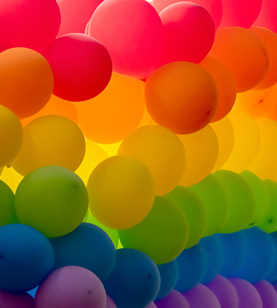 Rainbow colored balloons symbolizing the LGBTI community