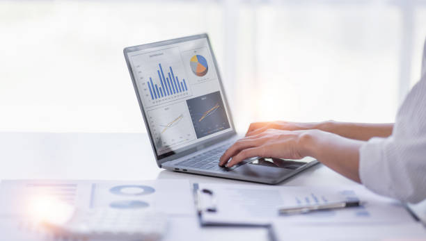 istock Businessman working at office with documents on his desk, doing planning analyzing the financial report, business plan investment, finance analysis concep 1409919346