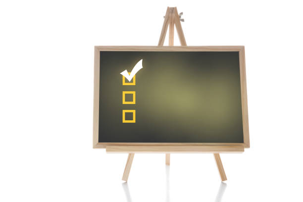istock Check list box with check mark on chalkboard on white background 1409919394