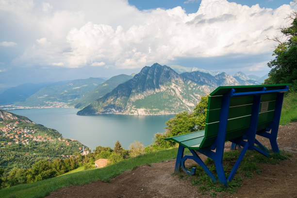 istock Green and blue big Bench and Iseo lake 1409919767