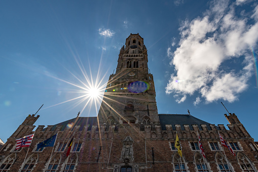 Bell Tower - Belfry of Bruges with sun beams