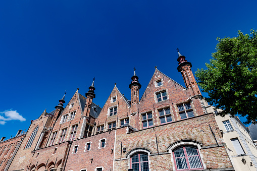 Looking up at typical Belgian architecture in Bruges