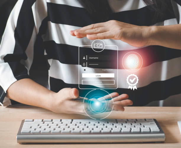 istock Businesswomen protecting personal data on laptop and virtual interfaces, user typing login and password, cyber security concept. 1409920952