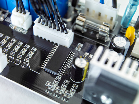 Powerful central processing unit presented in macro. Contact feet are gold plated for less resistance. The CPU is the heart of computers and servers. Electronics