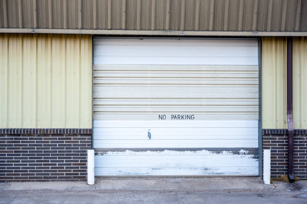 istock No parking written on rollup overhead service entrance door 1409922767