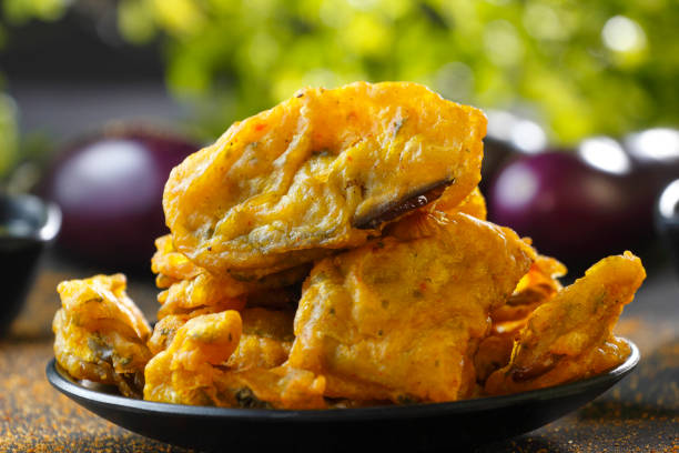 Brinjal pakoda or pakora with  sauce