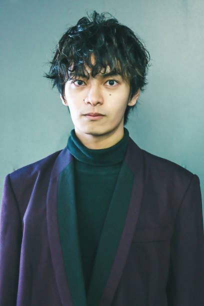istock Portrait Of Young Asian Man 1409926217