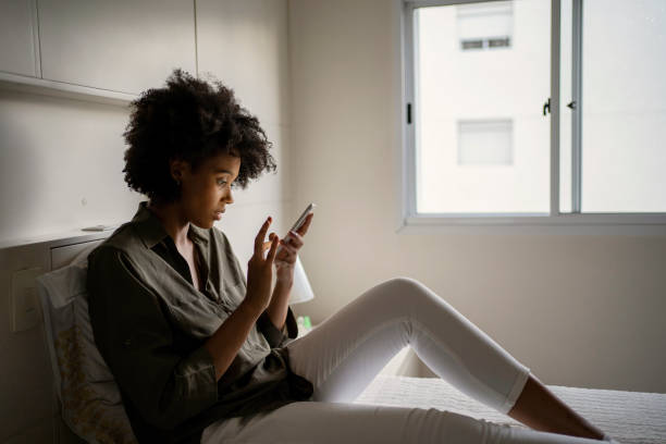 istock African American woman using smart phone 1409928427