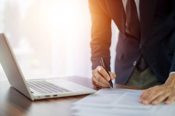 istock Businessman signature document working in office 1409928738