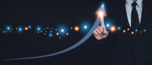 istock Business growth concept, Business development to success and growing growth concept, Businessman pointing arrow graph corporate future growth plan 1409928785