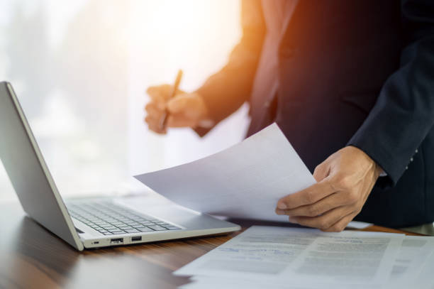 istock Businessman signature document working in office 1409928858