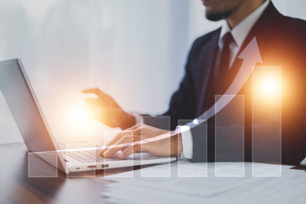 istock Business growth concept, Business development to success and growing growth concept, Businessman pointing arrow graph corporate future growth plan 1409928892