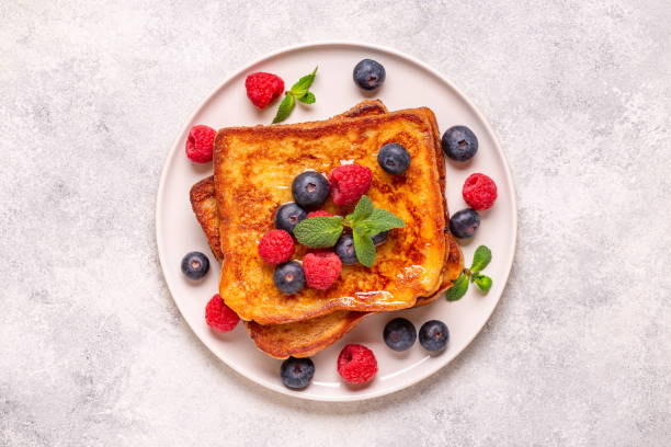 istock French toast with blueberries, raspberries, maple syrup 1409932435