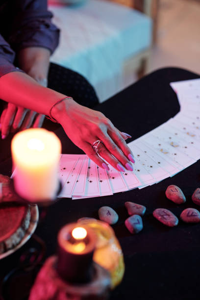 istock Fortune Teller Flipping Tarot Cards 1409935750