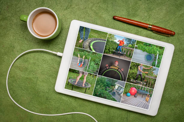 istock rebounding on a mini trampoline with Indian clubs 1409935796