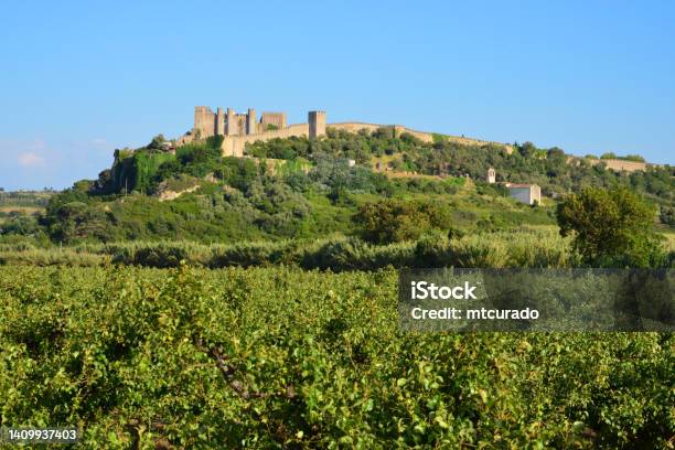 Walled Town Of Óbidos Seen From The Surrounding Orchards Leiria Portugal Stock Photo - Download Image Now