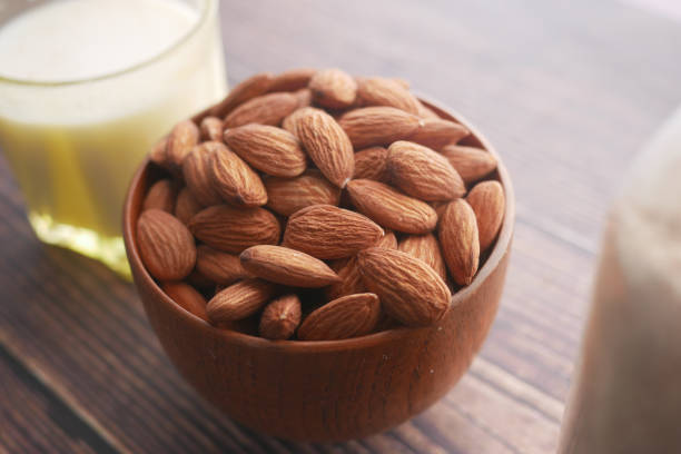istock almond nut and milk on table 1409937955