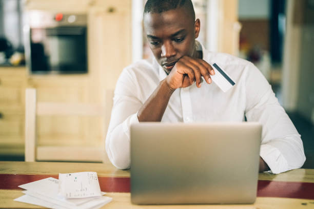 istock Man at home investing in crypto currency 1409940192