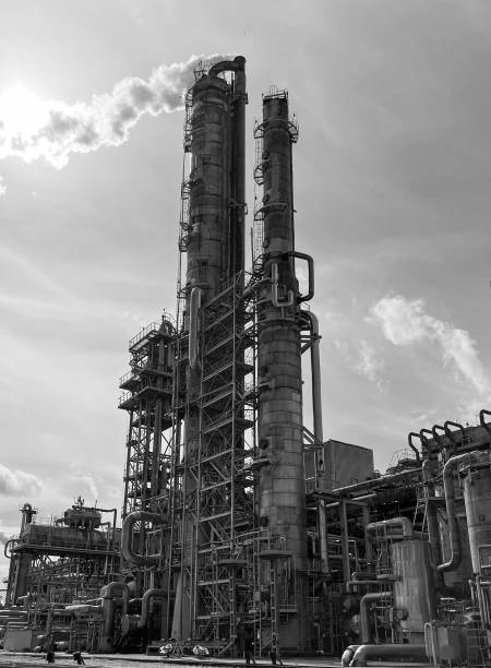 istock Large-capacity ammonia production workshop at a petrochemical plant with copyspace. Appearance on the CO2 absorption apparatus with monoethanolamine. Black and white photo 1409940459