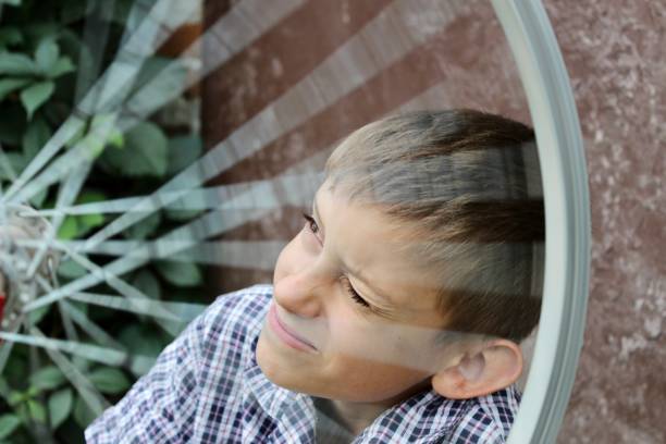 istock a boy is enthusiastically repairing a bicycle 1409941221