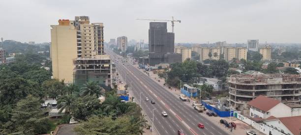 Kinshasa view Buildings in Kinshasa, Boulevard du 30 juin kinshasa stock pictures, royalty-free photos & images
